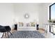 Stylish office with a couch, large window, and a modern aesthetic at 855 N East St # 302, Indianapolis, IN 46202