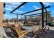 Outdoor seating area with pergola, grill, and fire pit at 855 N East St # 302, Indianapolis, IN 46202