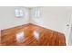 Bright bedroom with hardwood floors and ample natural light at 9157 Neptune Dr, Indianapolis, IN 46229