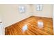 Spacious bedroom featuring hardwood floors and natural light at 9157 Neptune Dr, Indianapolis, IN 46229