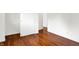 Bedroom featuring beautiful hardwood flooring, white walls, and closets at 9157 Neptune Dr, Indianapolis, IN 46229