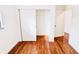 Bright bedroom with hardwood floors and spacious closet at 9157 Neptune Dr, Indianapolis, IN 46229