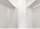 Walk-in closet with white walls and shelving at 9157 Neptune Dr, Indianapolis, IN 46229