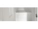 Empty closet with white walls and shelving at 9157 Neptune Dr, Indianapolis, IN 46229