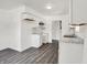 Modern kitchen with white cabinets and gray countertops, offering a clean and spacious cooking area at 9157 Neptune Dr, Indianapolis, IN 46229