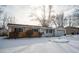 Ranch home with snow-covered yard at 9211 Shenandoah Dr, Indianapolis, IN 46229