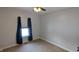 Empty bedroom with neutral walls, carpet, and window at 9915 N County Road 650 E, Pittsboro, IN 46167