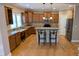 Modern kitchen with granite countertops and hardwood floors at 9915 N County Road 650 E, Pittsboro, IN 46167