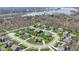 Picturesque aerial view of a suburban neighborhood near a lake, house location marked by a red pin at 11383 Sea Side Ct, Fishers, IN 46040