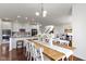 Stylish kitchen open to the dining and living areas, featuring stainless steel appliances at 11383 Sea Side Ct, Fishers, IN 46040