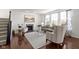 Inviting living room with fireplace, hardwood floors, and ample natural light at 11383 Sea Side Ct, Fishers, IN 46040