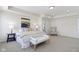 Bright main bedroom featuring carpet, a white accent bench, and a chair at 11383 Sea Side Ct, Fishers, IN 46040