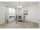 Bright office with a modern glass desk, comfortable chair, and stylish curtains at 11383 Sea Side Ct, Fishers, IN 46040