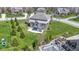 Aerial view of a home with a pool and patio area, surrounded by lush greenery at 11383 Sea Side Ct, Fishers, IN 46040