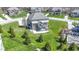 Aerial view of a home's backyard showcasing mature trees and a spacious lawn at 11383 Sea Side Ct, Fishers, IN 46040