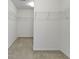 Spacious walk-in closet featuring wire shelving and neutral carpet at 11383 Sea Side Ct, Fishers, IN 46040