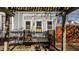 Charming back porch with a wood deck and wooden pergola at 1319 N New Jersey St, Indianapolis, IN 46202