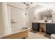 Bathroom with a clawfoot tub, double vanity, and bright lighting offers a functional and stylish space at 1319 N New Jersey St, Indianapolis, IN 46202