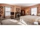 Cozy bedroom features a fireplace, soft lighting, and a comfortable bed, perfect for relaxation at 1319 N New Jersey St, Indianapolis, IN 46202