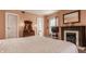 Inviting bedroom features a fireplace, hardwood floors, and plenty of natural light at 1319 N New Jersey St, Indianapolis, IN 46202