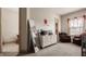 Spacious bedroom featuring a large mirror, dresser, and seating area at 1319 N New Jersey St, Indianapolis, IN 46202