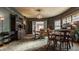 Formal dining area with decorative wallpaper, chandelier, and classic furniture at 1319 N New Jersey St, Indianapolis, IN 46202