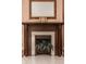 Intricate fireplace with fern decor, perfect for adding a touch of natural beauty to any room at 1319 N New Jersey St, Indianapolis, IN 46202