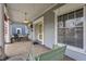 Spacious front porch featuring a porch swing and rocking chairs, offering a relaxing outdoor space at 1319 N New Jersey St, Indianapolis, IN 46202