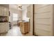Bright kitchen featuring white cabinets and dining area creating a cozy and functional space at 1319 N New Jersey St, Indianapolis, IN 46202