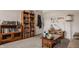 Cozy living room featuring a well-stocked bookcase and comfortable furniture at 1319 N New Jersey St, Indianapolis, IN 46202