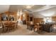 Spacious living room with wood-paneled walls, vaulted ceilings and comfortable seating areas, perfect for relaxing at 1319 N New Jersey St, Indianapolis, IN 46202