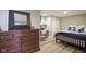 Basement bedroom with dresser, desk, and full-size bed at 16395 La Paloma Ct, Noblesville, IN 46060