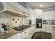 Bright kitchen, featuring gas cooktop and custom cabinetry at 16395 La Paloma Ct, Noblesville, IN 46060