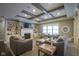 Living room with fireplace, built-ins, and comfortable seating at 16395 La Paloma Ct, Noblesville, IN 46060