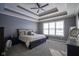 Spacious main bedroom with coffered ceiling and plush carpeting at 16395 La Paloma Ct, Noblesville, IN 46060