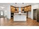 Modern kitchen with a large island, stainless steel appliances, and ample cabinetry at 20035 Meadow Neck Rd, Westfield, IN 46074