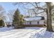 House backyard view with snow covered ground and tall trees at 2054 Horizon Blvd, Greenwood, IN 46143