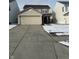 Charming two-story home with attached two-car garage and concrete driveway at 2734 Mingo Ct, Indianapolis, IN 46217