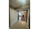 Hallway leading to the living room, featuring a coat closet at 2734 Mingo Ct, Indianapolis, IN 46217