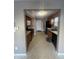 Open kitchen layout with stainless steel appliances and wooden cabinets at 2734 Mingo Ct, Indianapolis, IN 46217