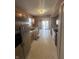 Functional kitchen includes stainless steel refrigerator, dishwasher, and neutral countertops at 2734 Mingo Ct, Indianapolis, IN 46217