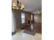 Spacious living room with hardwood-style floors, a fireplace, and neutral wall color at 2734 Mingo Ct, Indianapolis, IN 46217