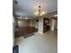 Open-concept living room features hardwood-style floors, fireplace, and a ceiling fan at 2734 Mingo Ct, Indianapolis, IN 46217