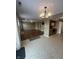 Open living space showcasing living room, dining area, and a view into the kitchen at 2734 Mingo Ct, Indianapolis, IN 46217