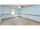 Light-filled bedroom with carpet flooring, baseboard trim and a window at 306 Vinewood N Dr, Brownsburg, IN 46112