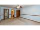 Spacious bedroom with a ceiling fan and views to an adjoining bathroom at 306 Vinewood N Dr, Brownsburg, IN 46112