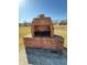 Close up of the backyard brick barbecue oven on concrete base on a bright and sunny day at 306 Vinewood N Dr, Brownsburg, IN 46112