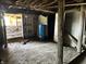 Unfinished basement with water heater and exterior access at 3480 S Us Highway 31, Franklin, IN 46131