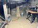 Partially finished basement with workbench and propane tank at 3480 S Us Highway 31, Franklin, IN 46131