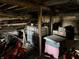 Unfinished basement area with motorcycle and storage at 3480 S Us Highway 31, Franklin, IN 46131